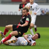 Wiesbaden, Brita-Arena, 14.01.2023, Spieltag 18 Fussball 3. Liga, SV Wehen Wiesbaden - SV Elversberg, v.l. Benedict Hollerbach (SV Wehen Wiesbaden), Jannik Rochell (SV 07 Elversberg)